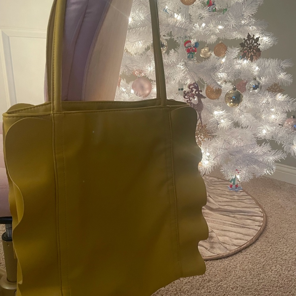 yellow shoulder bag with side ruffles